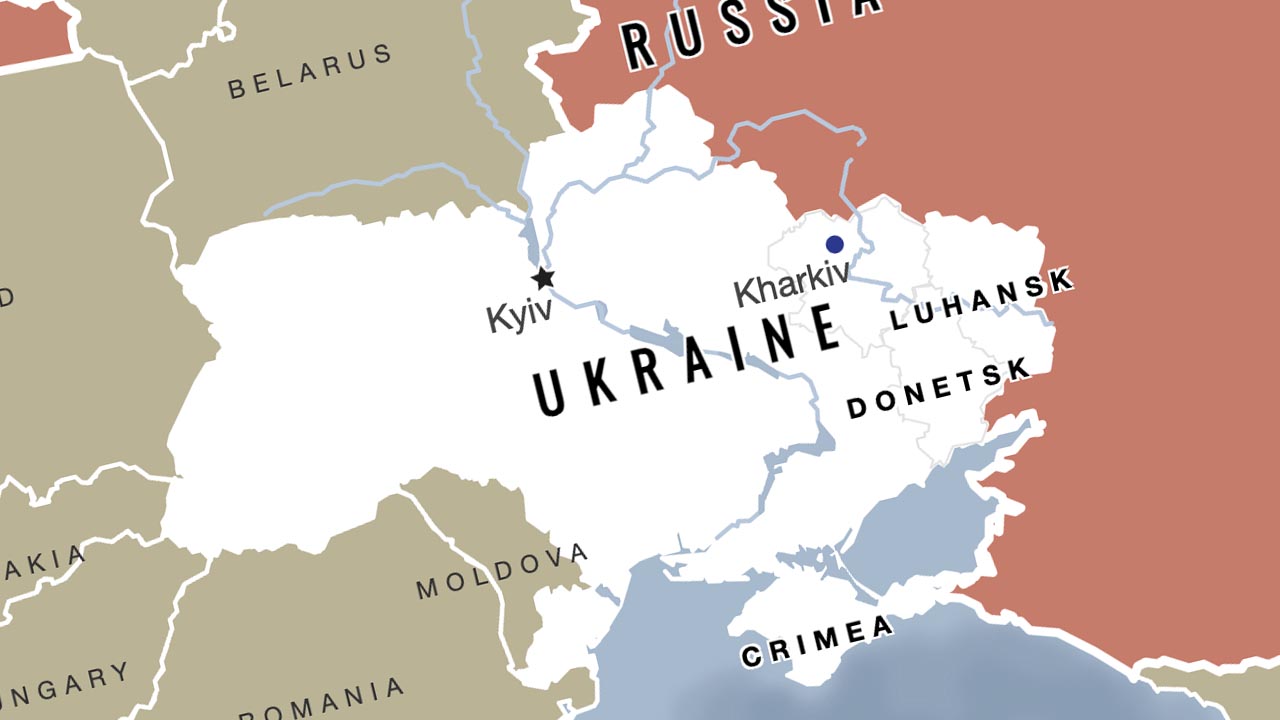 A screenshot of pie chart showing a breakdown of China’s development spending around the world, collaged with a photo of a farmer working a field.