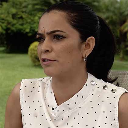 Screenshot portrait of Ashmita Sapkota sitting outside.