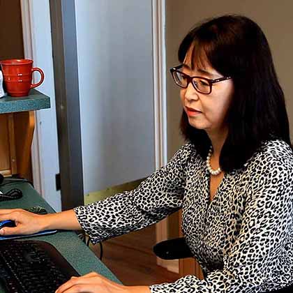 Emily Pei moved to Canada 12 years ago. (VOA News)  