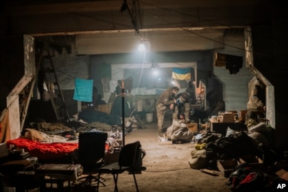 Ukrainian soldiers inside the ruined Azovstal Iron and Steel Works, in a photo provided by the Azov Special Forces Regiment of the Ukrainian National Guard Press Office, May 7, 2022.  